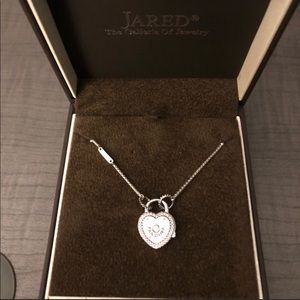 Pandora 23.6 heart necklace with heart pendant.